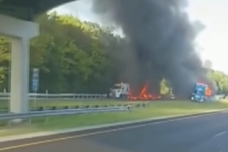 Fire engulfs four tractor trailers in crash that took one driver’s life