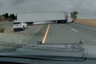 Semi truck ruptures own air line attempting u-turn through I-5 median 