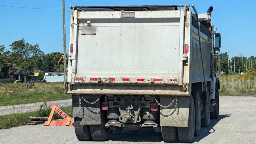 Dump truck placed OOS after officer finds no front brakes at all during inspection