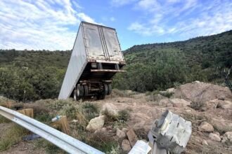 Truck driver loses control on winding mountain roadway in Arizona, crashes down 'steep ravine'