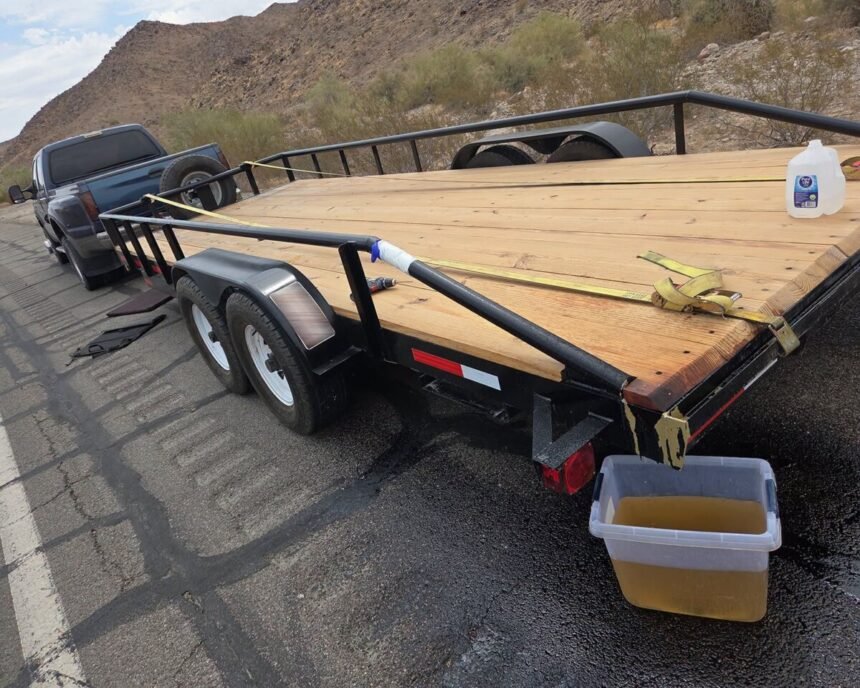 Arizona troopers seize 106 gallons of liquid meth from frame of pickup truck's towed trailer
