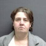 Murder charges lobbed at motorist who drove head on into semi truck with intent to kill her passengers & herself