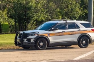 Trooper conducting roadside CMV inspections gets door taken out by passing box truck