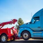 Men charged for private and commercial vehicle theft ring using predatory towing practices, forgery