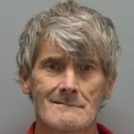 Man arrested for filming others in truck stop restroom, Florida sheriff says