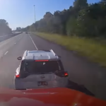 Motorist evades warrant after police use dash cam to catch him falsely accusing trucker of causing road rage incident 