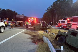 Trucker reports locked steering led to load of Humvees littering I-295